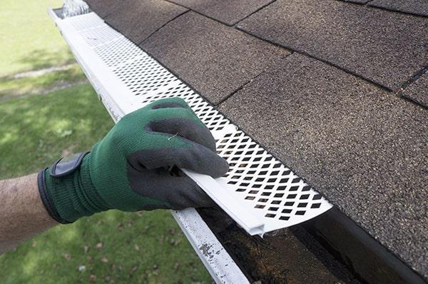 regular maintenance for gutter guards typically involves cleaning off debris and checking for any signs of damage or blockages